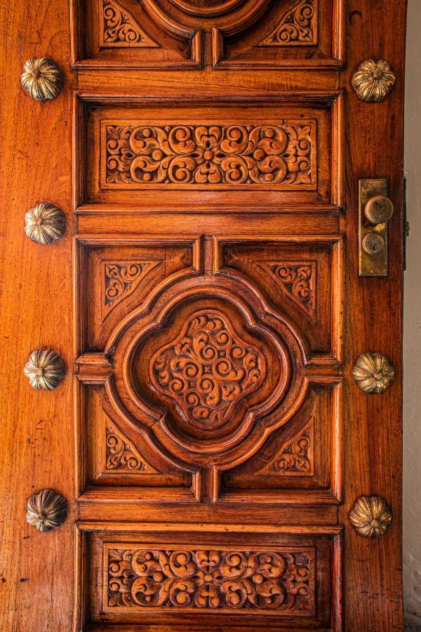 Casa Del Balam Merida Exterior photo Detail of the door