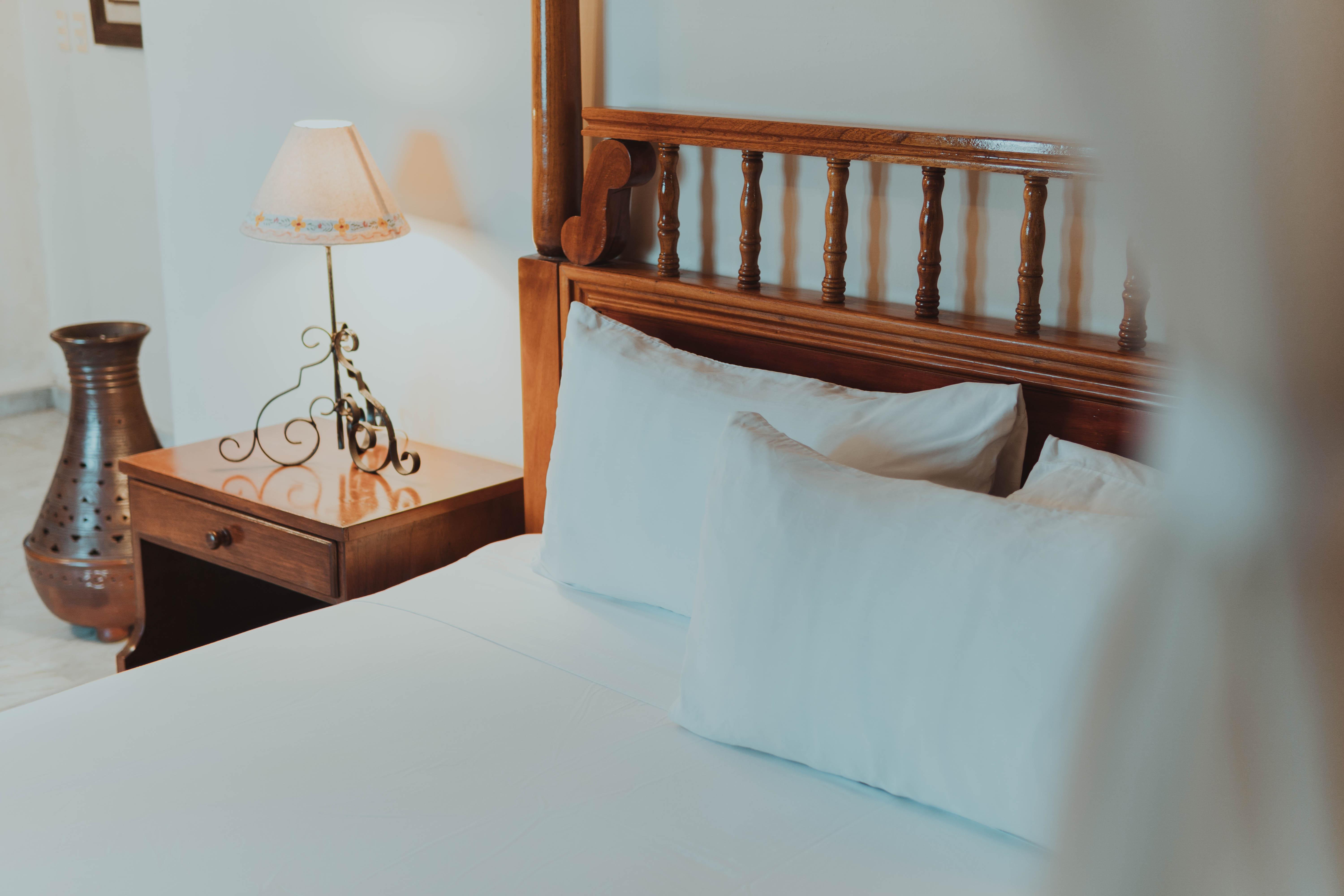 Casa Del Balam Merida Exterior photo A bed with a nightstand